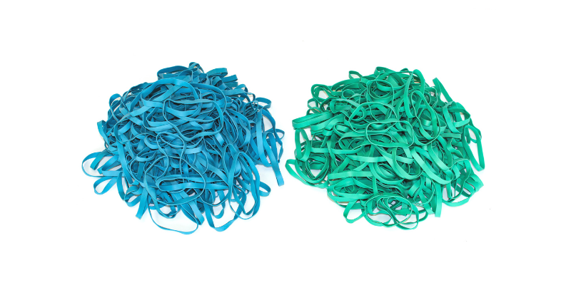 Blue and green postal rubber bands used for high-volume mail bundling
